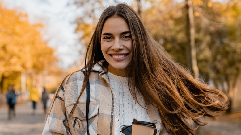 A woman with brown hair 