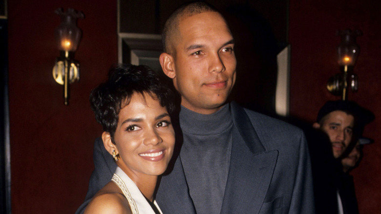 Halle Berry and David Justice smiling at event