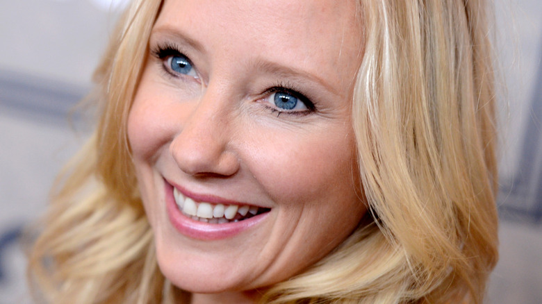 Anne Heche smiling at event