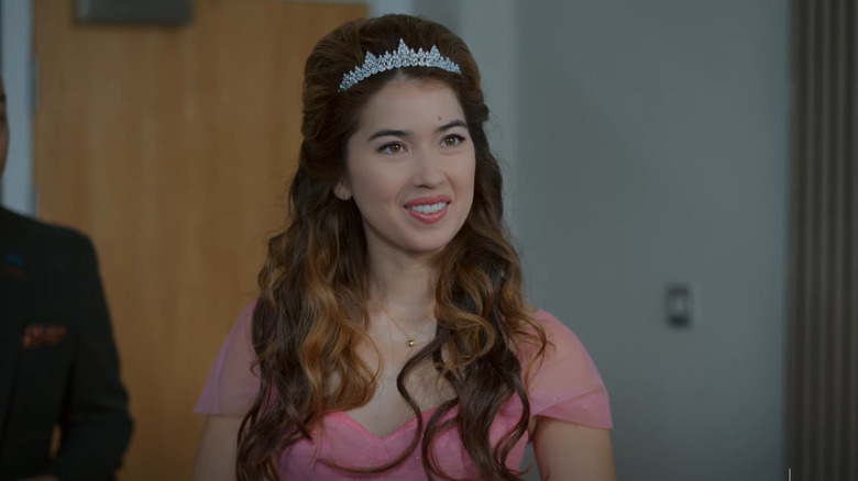 Nichole Sakura smiling while wearing a tiara