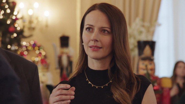 Hallmark Christmas movie "Crashing Through The Snow," starring Amy Acker as Maggie Collins.