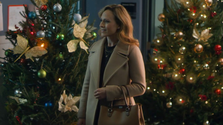 Still of Hallmark Christmas movie "Five More Minutes," starring Nikki DeLoach.