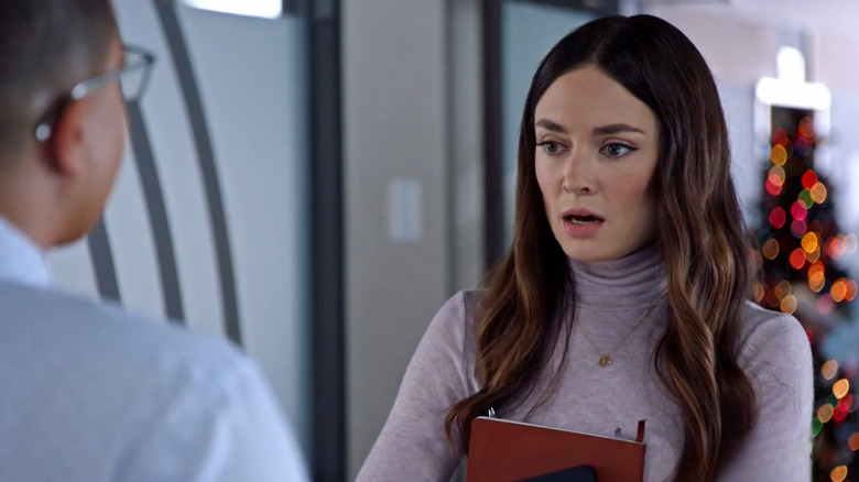Hallmark Christmas movie "On the 12th Date of Christmas," starring  Mallory Jansen as Jennifer Holloway.