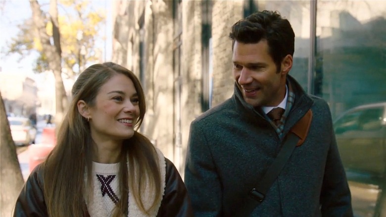 Aaron O'Connell as Conrad (left) and Kim Matula as Emma (right) walking in 