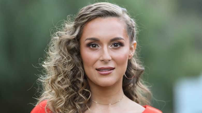 Alexa PenaVega looks at camera