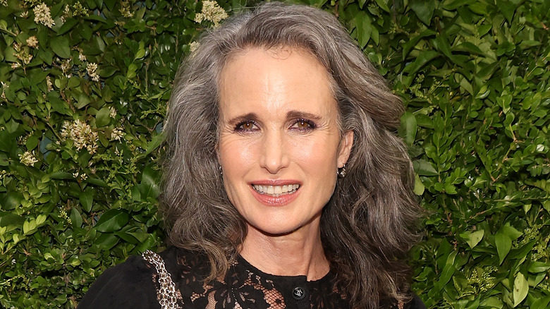 Andie MacDowell smiling at event
