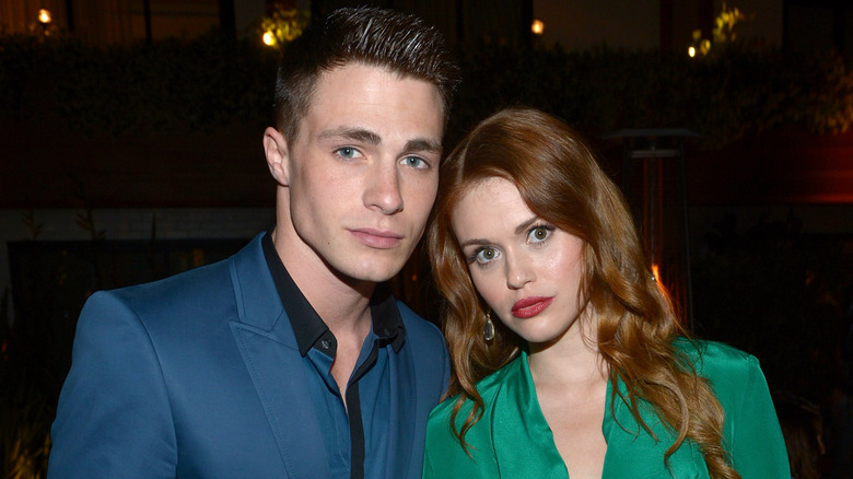 Colton Haynes and Holland Roden posing