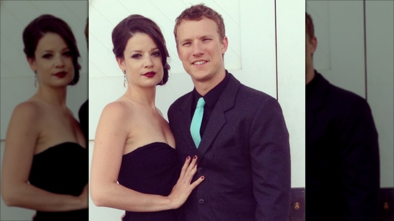 Kimberley Sustad and Scot Sustad posing together early in their relationship