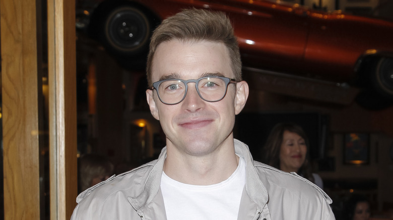 Chandler Massey poses at an event