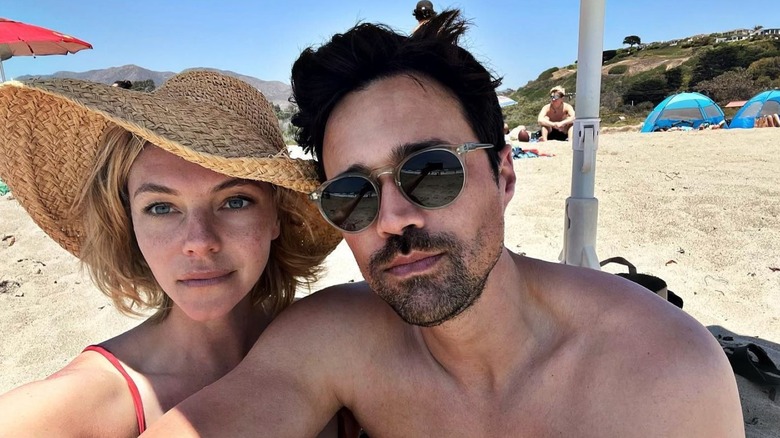 Eloise Mumford and Brett Dalton on the beach