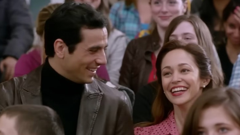 Antonio Cupo smilng at Autumn Reeser in a crowd