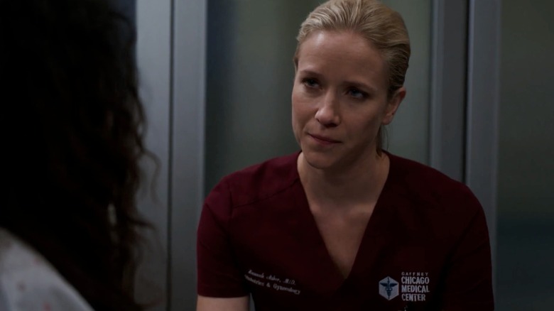 Jessy Schram smiling as Dr. Hannah Asher on Chicago Med