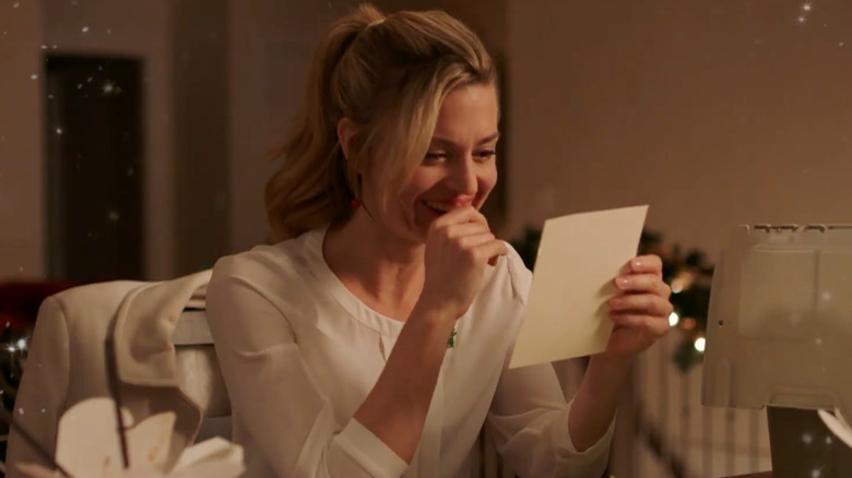 Brooke D'Orsay reading a letter in Miss Christmas