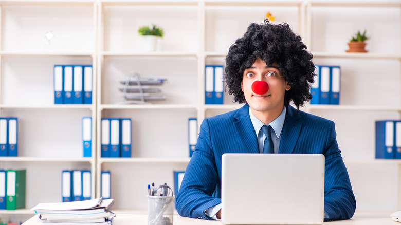 Clown wig and nose, office setting