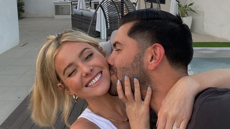 Hannah Godwin and Dylan Barbour kissing