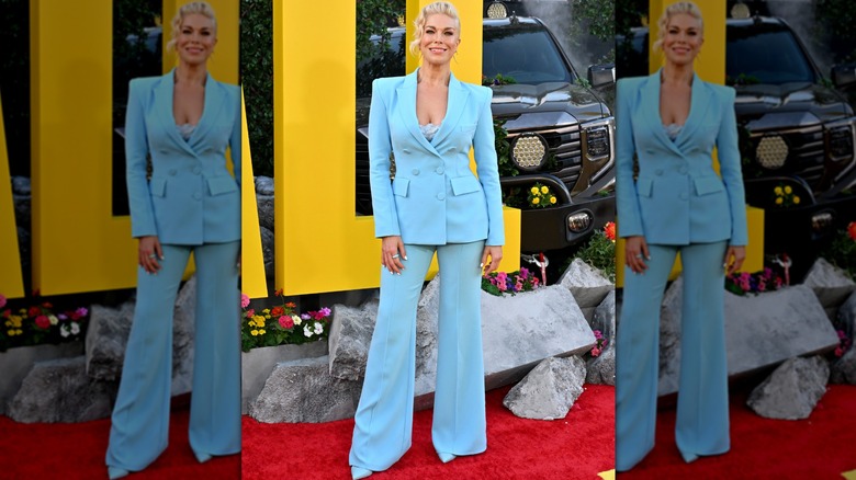 Hannah Waddingham wearing a powder blue suit.