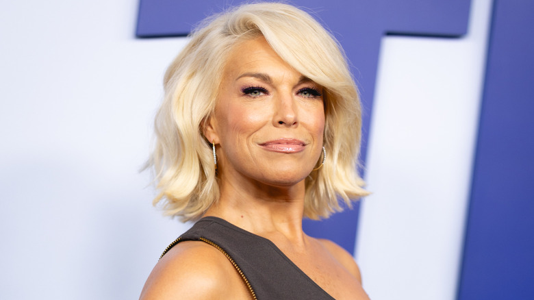 Hannah Waddingham with her hair styled in a side-swept long bob.