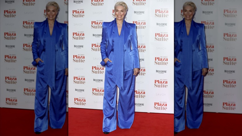 Hannah Waddingham wearing a blue satin suit.