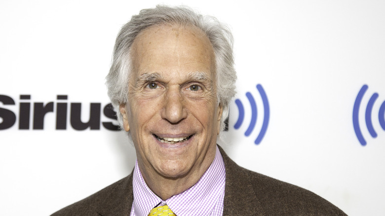 Henry Winkler posing at an event