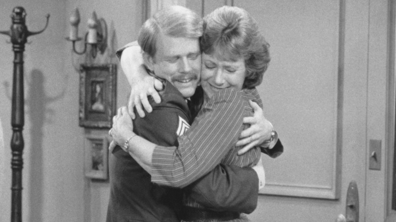 Marion Ross hugging Ron Howard in a Happy Days scene in 1983
