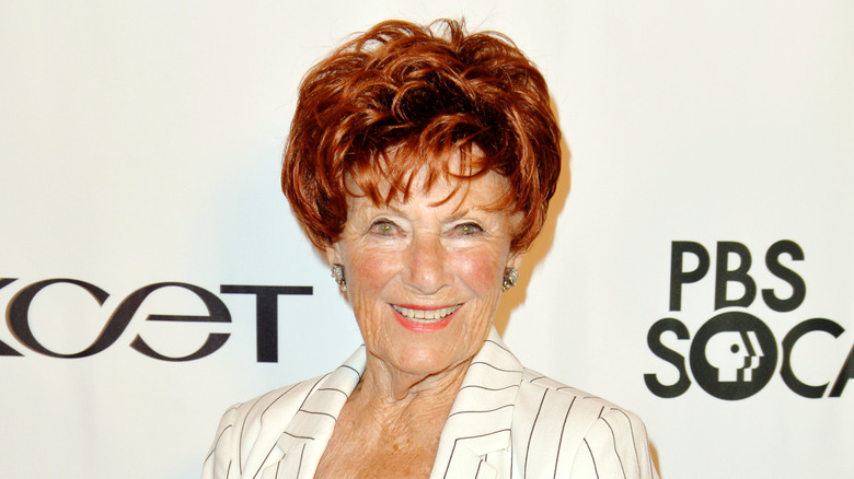 Marion Ross wearing a white pinstripe blazer