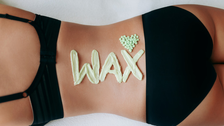 woman with wax on her back