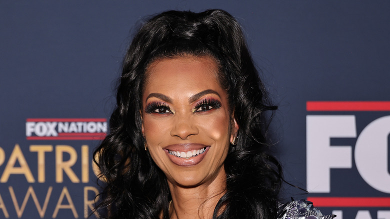 Harris Faulkner smiling in a silver dress at the 2024 Patriot awards.