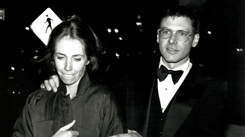 Harrison Ford and Melissa Mathison walking in 1981