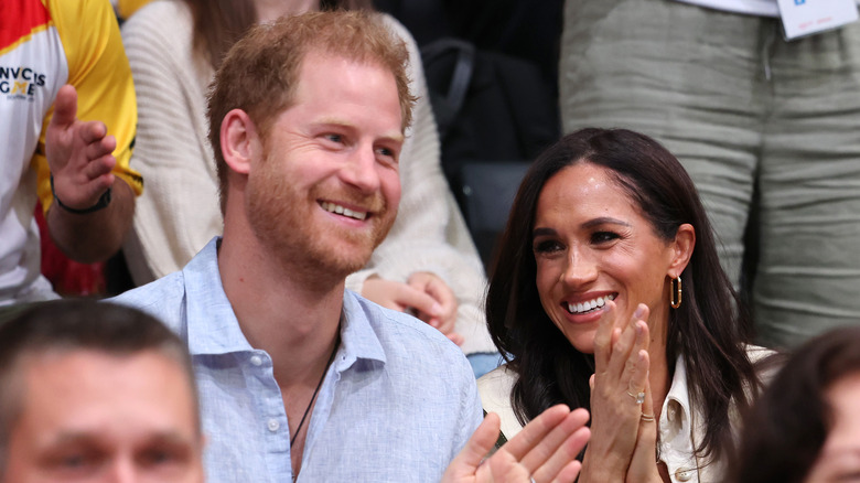 Prince harry and meghan markle smiling