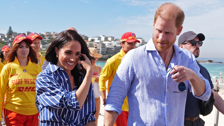 Prince Harry and Meghan Markle walking in Australia