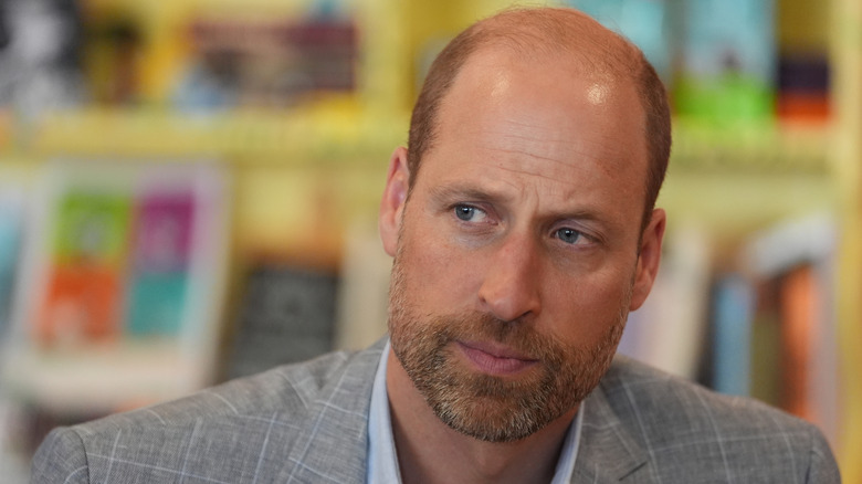 Prince William frowning