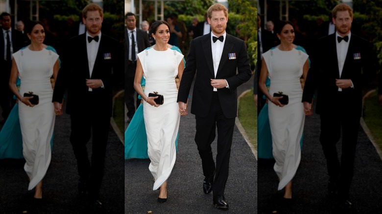 Meghan Markle and Prince Harry hold hands and walk in formal outfits