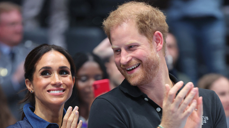 Harry and Meghan clapping