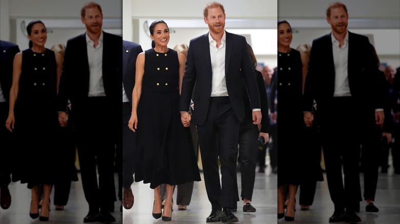 Meghan Markle and Prince Harry holding hands