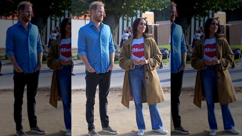 Prince Harry and Meghan Markle standing together outside