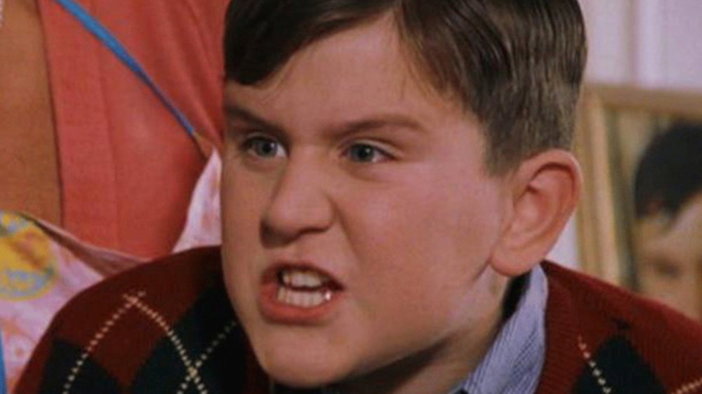 Harry Melling sneers as Dudley Dursley in Harry Potter