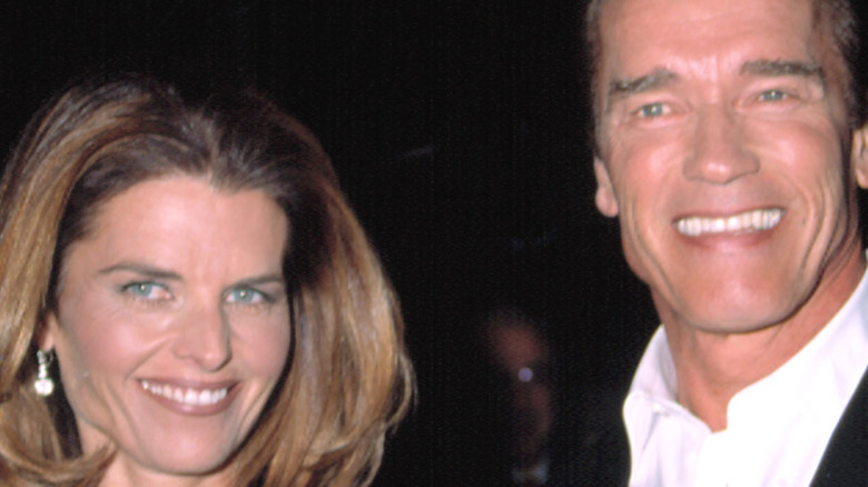 Arnold Schwarzenegger and Maria Shriver smiling 