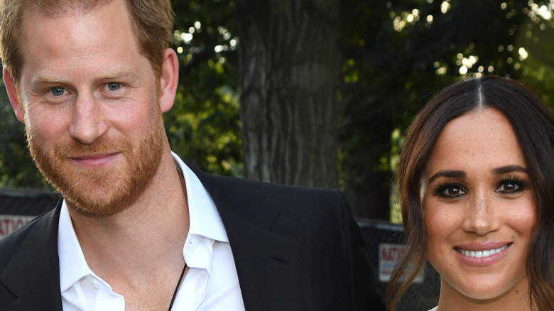 Prince Harry and Meghan Markle smiling in NYC