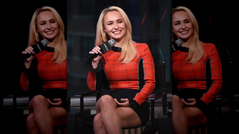 Hayden Panettiere smiling with microphone