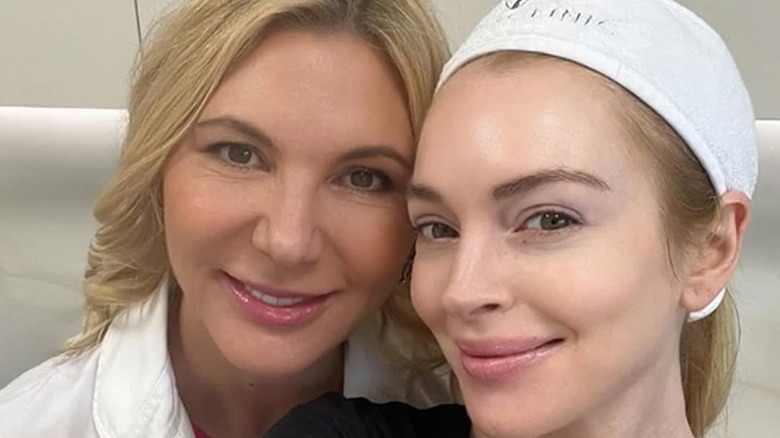 Dr. Radmila Lukian and Lindsay Lohan smiling selfie