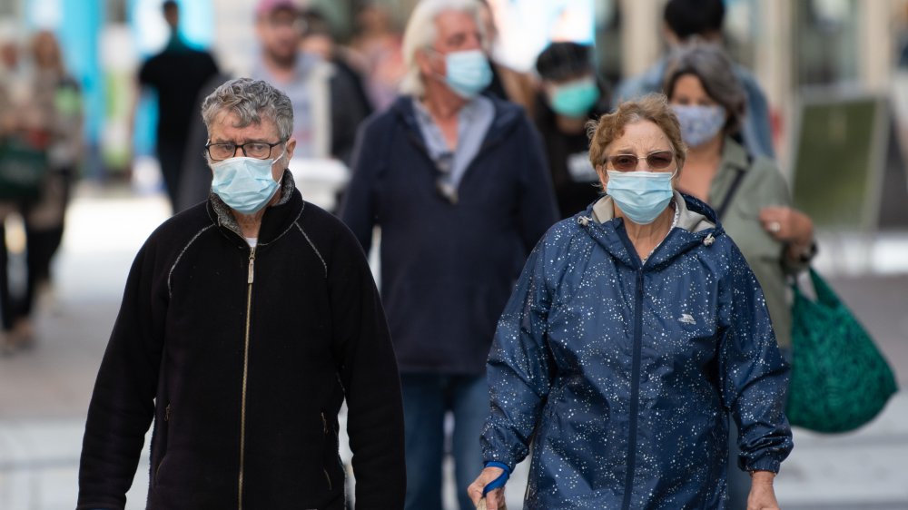 People on the street with masks on