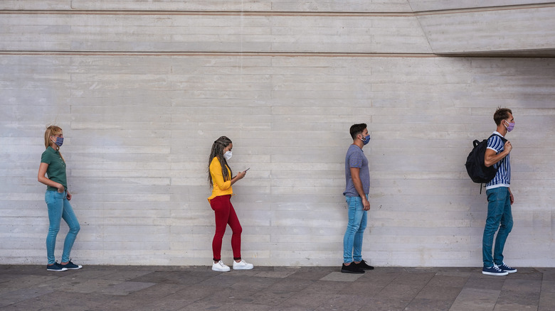 Young people waiting in line