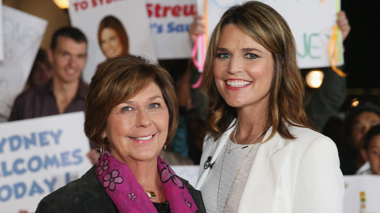 Nancy and Savannah Guthrie smiling while posing together at an event