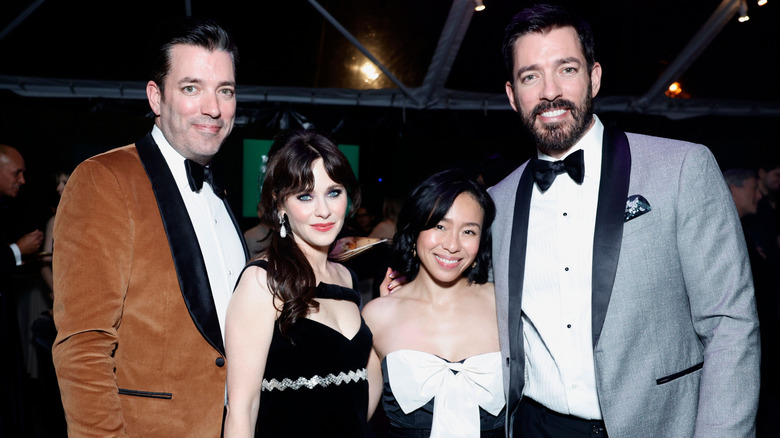 Jonathan Scott, Zooey Deschanel, Linda Phan, and Drew Scott in formal attire