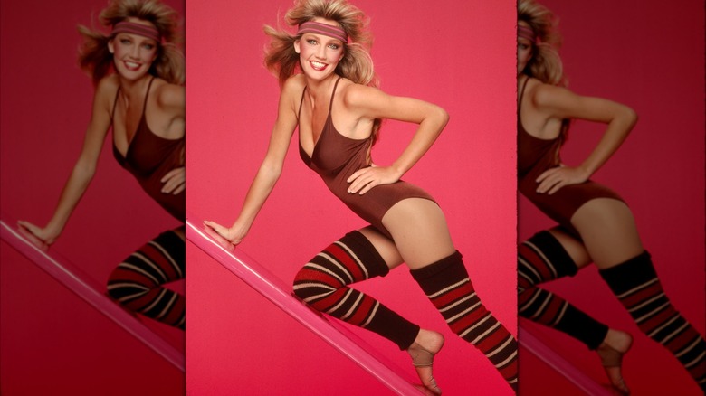 Heather Locklear smiling in workout gear