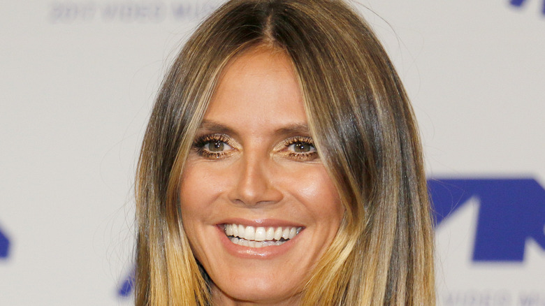 Heidi Klum smiling on red carpet