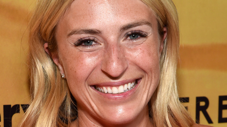 Jasmine Roth smiling big on the red carpet
