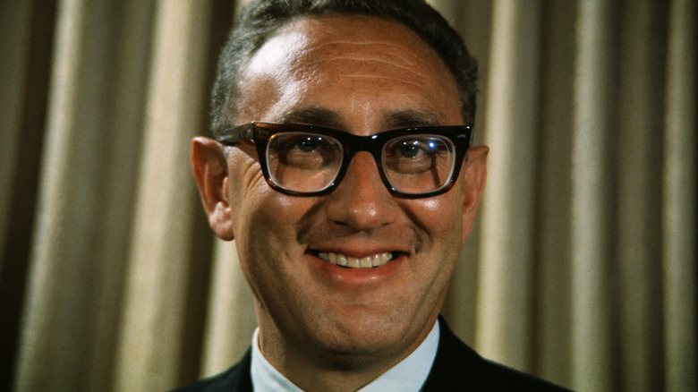 Henry Kissinger smiling