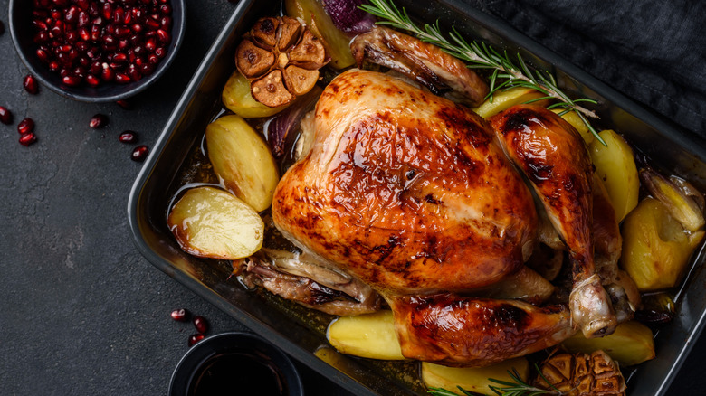 Thanksgiving turkey in a dish with vegetables