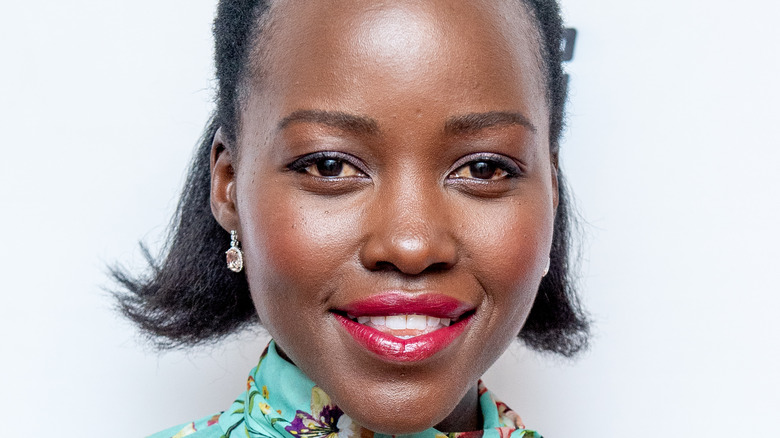 Lupita Nyong'o posing on the red carpet